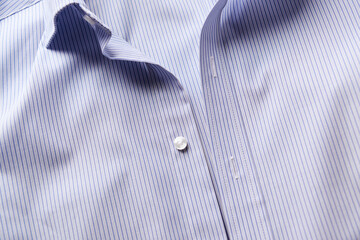 Close up of men's striped shirt.