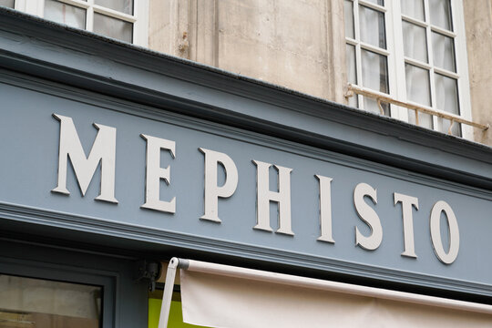Mephisto sign logo shop shoes store of shoes and footwear manufacturer