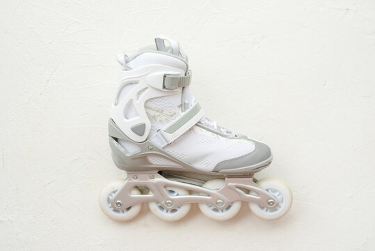 White Roller Skates On The White Background.