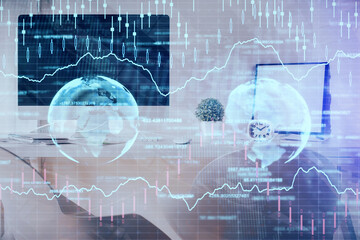 Fototapeta premium Multi exposure of stock market chart drawing and office interior background. Concept of financial analysis.