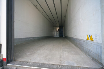 Interior of an empty refrigerated trailer before loading.