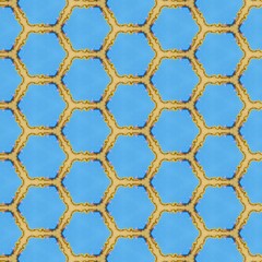 Elegant and ornamental blue color symmetrical designs on solid sheet of wallpaper. Concept of home decor and interior designing