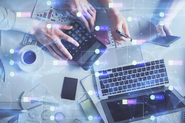 Double exposure of man and woman working together and data theme hologram drawing. Computer background. Top View.