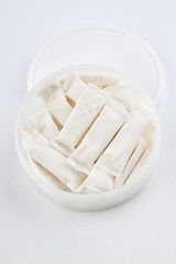 snus nicotine bags. chewing tobaсco product over white background. alternative to smoking cigarettes.