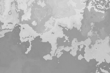 Obraz premium Different shades of grey color cloudy and wavy layout on solid sheet of wallpaper. Concept of home decor and interior designing