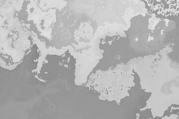 Different shades of grey color cloudy and wavy layout on solid sheet of wallpaper. Concept of home decor and interior designing.