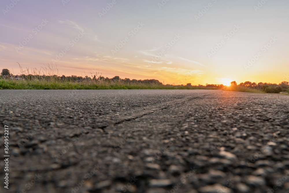 Wall mural landscape nature empty road street with green plant under sunset background change to gold natural l