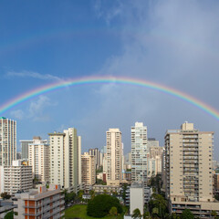 double rainbow over skyline straight-on