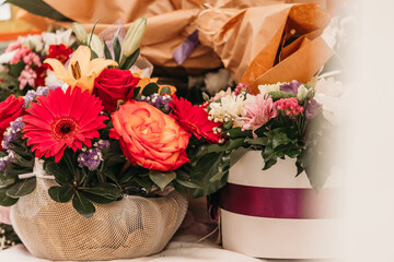Mix of different flowers as gift in vase 