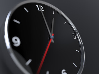 Modern black wall clock showing one o'clock on dark background. Office clock showing 1am or 1pm on black texture