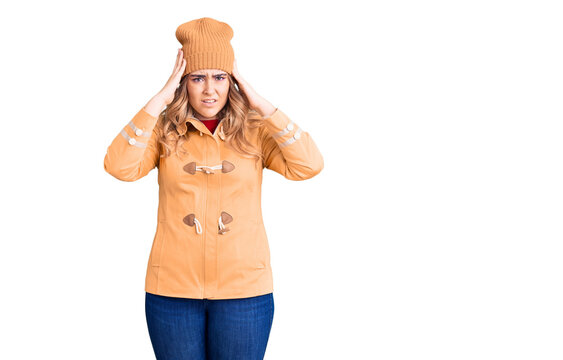 Young caucasian woman wearing casual clothes suffering from headache desperate and stressed because pain and migraine. hands on head.