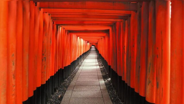 POV View Of Traditional Japanese Torii Gates at Fushimi Inari Taisha religios in Kyoto city, Japan.