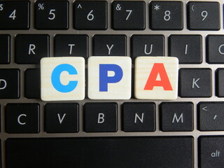 Abbreviation CPA (Cost Per Acquisition) on keyboard background