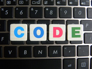 Word Code on keyboard background