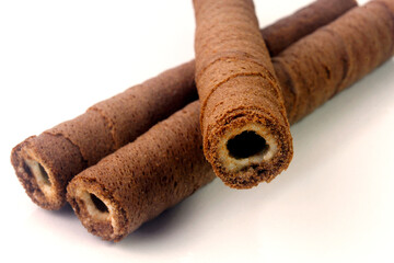 chocolate wafer rolls cookie sticks isolated on white background