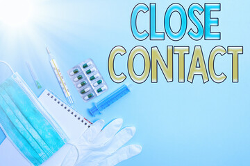 Writing note showing Close Contact. Business concept for having a history of direct exposure to a...