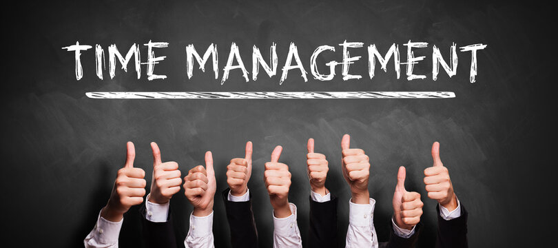 many thumbs up and the message TIME MANAGEMENT on a blackboard