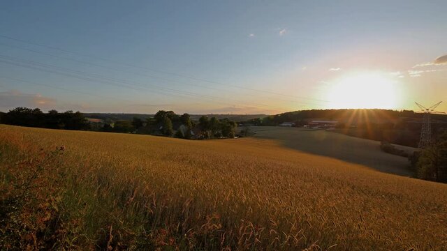 sunset over the fields in germany by velbert langenberg - timelapse