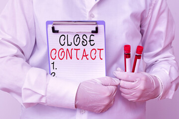 Conceptual hand writing showing Close Contact. Concept meaning having a history of direct exposure...