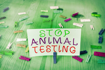 Conceptual hand writing showing Stop Animal Testing. Concept meaning put an end on animal...