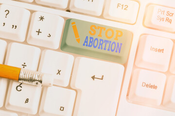 Conceptual hand writing showing Stop Abortion. Concept meaning advocating against the practice of...
