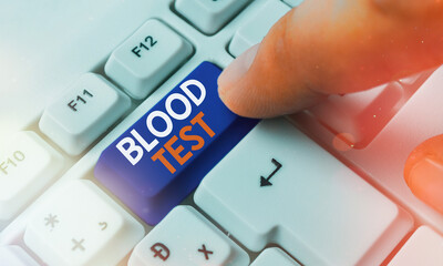 Text sign showing Blood Test. Business photo showcasing Extracted blood sample from an organism to...