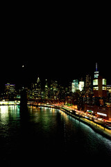 Fototapeta na wymiar New York, NY, U.S.A. - Night view of East River and Financial District in Manhattan