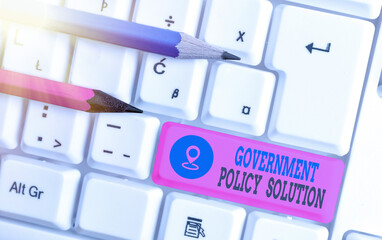 Writing note showing Government Policy Solution. Business concept for designed game plan created in...