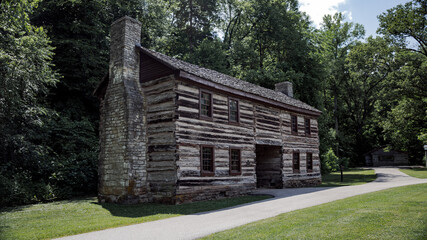 Fototapeta premium old log house in the park