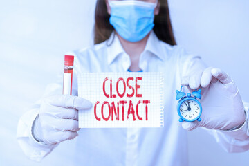 Conceptual hand writing showing Close Contact. Concept meaning having a history of direct exposure...