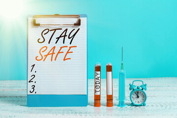 Text sign showing Stay Safe. Business photo showcasing secure from threat of danger, harm or place...