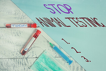 Handwriting text writing Stop Animal Testing. Conceptual photo put an end on animal experimentation...