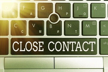 Conceptual hand writing showing Close Contact. Concept meaning having a history of direct exposure...