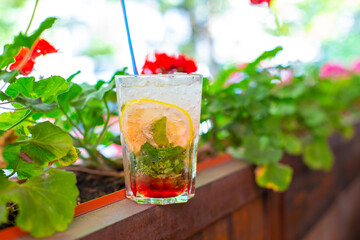 Refreshing mojito with crushed ice on a hot summer day