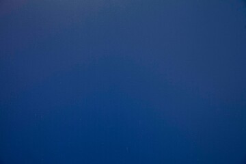 Dark blue sprayed steel sheet texture and background