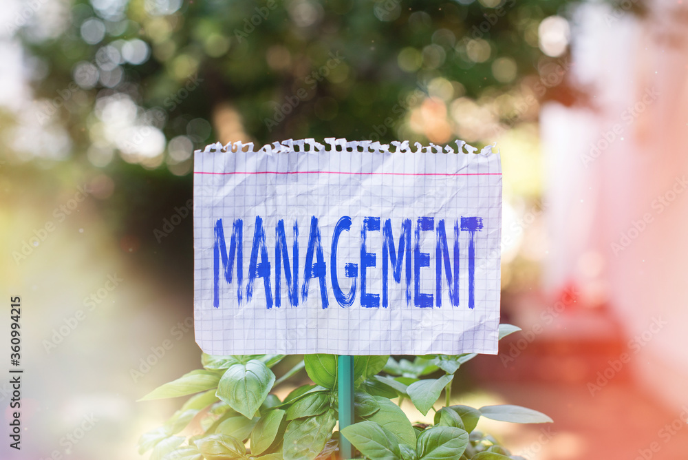 Aufkleber handwriting text management. conceptual photo the authoritative act of directing or controlling thin