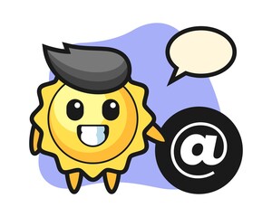 Sun cartoon standing beside the At symbol