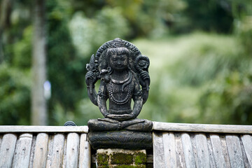 Fototapeta na wymiar Traditional statue of God in Bali