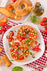 Friselle with tomatoes and chickpeas.	