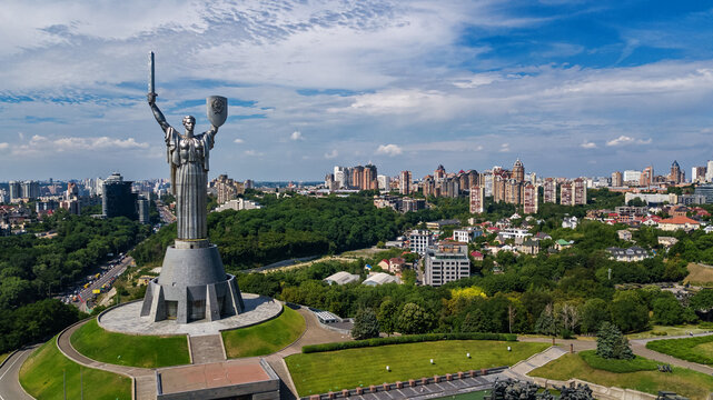 Aerial drone view of Kyiv city hills and parks from above, Kiev cityscape and skyline in spring, Ukraine