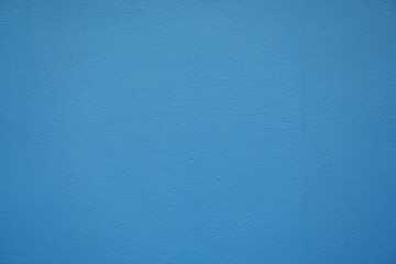 Clean blue color rough surface concrete wall