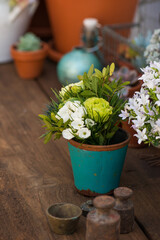 Little flower bouquet on a old garden table