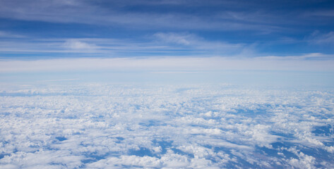 Landscape with atmosphere of Earth and beautiful white clouds with blue sky background