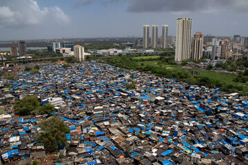 Mumbai, Maharashtra, India; building and slum's aerial view