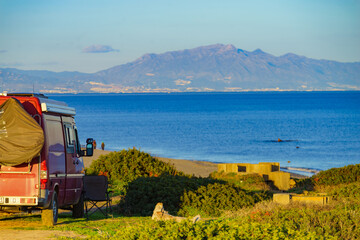 Fototapeta premium Campervan on beach by Punta Mala, Alcaidesa Spain