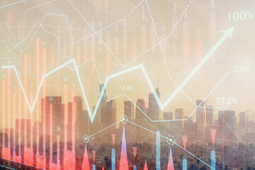 Forex chart on cityscape with skyscrapers wallpaper double exposure. Financial research concept.