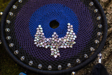 Handmade dream catcher with feathers threads and beads rope hanging