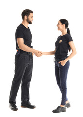 Police officers shaking hands on white background