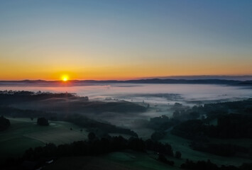 Fototapeta premium Drone panorama photo - dawn with early fog at blue hour