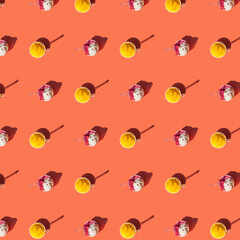 Naklejka premium colorful ice cream cup on orange background pattern